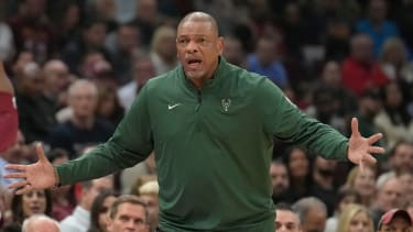 Milwaukee Bucks head coach Doc Rivers shouts to an official in the first half of an NBA basketball game against the Cleveland Cavaliers, Monday, Nov. 4, 2024, in Cleveland. (AP Photo/Sue Ogrocki)