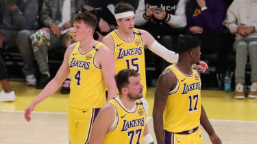 LOS ANGELES, CA - FEBRUARY 19: Los Angeles Lakers young core of guard Dalton Knecht (4), guard Austin Reaves (15), forward Dorian Finney-Smith (17) and guard Luka Doncic (77) during the NBA, Basketball Herren, USA game between the Charlotte Hornets and the Los Angeles Lakers on February 19, 2025, at Crypto.com Arena in Los Angeles, CA. (Photo by Jevone Moore Icon Sportswire) NBA: FEB 19 Hornets at Lakers EDITORIAL USE ONLY Icon20250219076