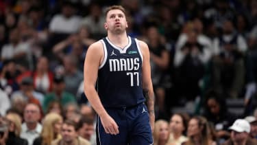 Dallas Mavericks guard Luka Doncic lets out a breath as he competes against the Houston Rockets in an NBA basketball game in Dallas, Thursday, Oct. 31, 2024. (AP Photo/Tony Gutierrez)