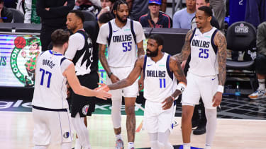 LOS ANGELES, CA - APRIL 23: Luka Doncic #77 of the Dallas Mavericks & Kyrie Irving #11 of the Dallas Mavericks high five during the game against the LA Clippers during Round 1 Game 2 of the 2024 NBA Playoffs on April 23, 2024 at Crypto.Com Arena in Los Angeles, California. NOTE TO USER: User expressly acknowledges and agrees that, by downloading and/or using this Photograph, user is consenting to the terms and conditions of the Getty Images License Agreement. Mandatory Copyright Notice: Copyright 2024 NBAE (Photo by Adam Pantozzi/NBAE via Getty Images)