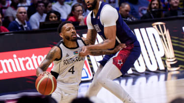 July 20, 2024, London, London, England: London, England, July 20 2024: Carlik Jones (4 South Sudan) and Anthony Davis (14 USA) in action during the USA Basketball Showcase game between USA and South Sudan at The O2 Arena in London, England. (Credit Image: © Pedro Porru/Sport Press Photo via ZUMA Press