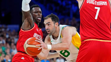 Olympics: Basketball-Men Group B - BRA vs GER Jul 30, 2024; Villeneuve-d Ascq, France; Brazil shooting guard Vitor Benite (8) shoots the ball against Germany point guard Dennis Schroder (17) and centre Johannes Voigtmann (7) in men™s basketball group B play during the Paris 2024 Olympic Summer Games at Stade Pierre-Mauroy. Villeneuve-d Ascq Stade Pierre-Mauroy France, EDITORIAL USE ONLY PUBLICATIONxINxGERxSUIxAUTxONLY Copyright: xJohnxDavidxMercerx 20240730_pjc_pb5_1796