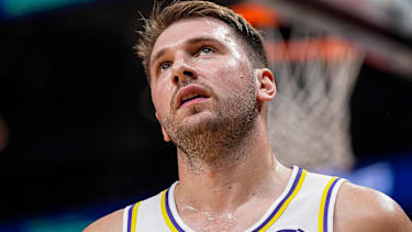 Nov 8, 2025; Atlanta, Georgia, USA; Los Angeles Lakers guard Luka Doncic (77) reacts after a call during the game against the Atlanta Hawks during the first half at State Farm Arena. Mandatory Credit: Dale Zanine-Imagn Images
