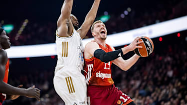 MUNICH, GERMANY - MARCH 19: Andreas Andi Obst (FC Bayern Muenchen, 13) controls the ball against Mfiondu Kabengele (Dubai Basketball, 17) during the Turkish Airlines EuroLeague match between FC Bayern Muenchen vs.Dubai Basketball at SAP Garden on round 32 of Turkish Airlines EuroLeague on March 19, 2026 in Munich, Germany. Bavaria Germany Copyright: xSteffiexWunderlx