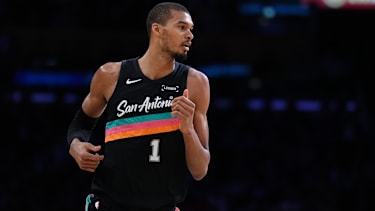 San Antonio Spurs forward Victor Wembanyama jogs up the court during the first half of an NBA basketball game against the Los Angeles Lakers Tuesday, Feb. 10, 2026, in Los Angeles. (AP Photo/Jae C. Hong)