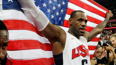 United States' LeBron James celebrates after the men's gold medal basketball game at the 2012 Summer Olympics, Sunday, Aug. 12, 2012, in London. USA won 107-100. (AP Photo/Eric Gay)