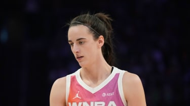 Caitlin Clark, of Team WNBA, pauses on the court during the first half of a WNBA All-Star basketball game against Team USA Saturday, July 20, 2024, in Phoenix. (AP Photo/Ross D. Franklin)