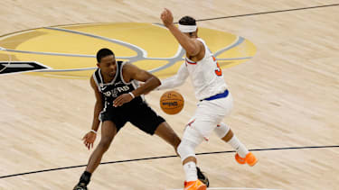 Jun 3, 2026; San Antonio, Texas, USA; New York Knicks guard Josh Hart (3) steals the bal from San Antonio Spurs guard De'aaron Fox (4) in the second half during game one of the 2026 NBA Finals at Frost Bank Center. Mandatory Credit: Geoff Burke-Imagn Images