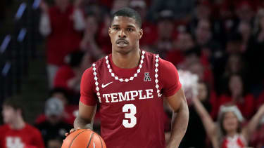 Temple's Hysier Miller (3) brings the ball up the court against Houston during the second half of an NCAA college basketball game Sunday, Jan. 22, 2023, in Houston. Temple won 56-55. (AP Photo/David J. Phillip)