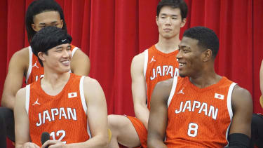 Los Angeles Lakers forward Rui Hachimura (front, R) and former Memphis Grizzlies swingman Yuta Watanabe (front, L) smile during a press conference in Tokyo on July 10, 2024, to announce the members of Japan's men's national basketball team for the Paris Olympics. (Kyodo)