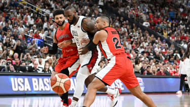 Basketball: USA Basketball Showcase - Las Vegas Jul 10, 2024; Las Vegas, Nevada, USA; USA forward Lebron James (6) collides with Canada guard Jamal Murray (4) and forward Dillion Brooks (24) in the first quarter of the USA Basketball Showcase at T-Mobile Arena. Las Vegas T-Mobile Arena Nevada USA, EDITORIAL USE ONLY PUBLICATIONxINxGERxSUIxAUTxONLY Copyright: xCandicexWardx 202407010_jhp_wb4_0504
