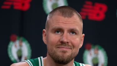 Boston Celtics' Kristaps Porzingis at a news conference during the NBA basketball team's media day, Tuesday, Sept. 24, 2024, in Boston. (AP Photo/Michael Dwyer)