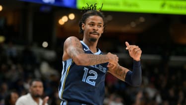Memphis Grizzlies guard Ja Morant (12) plays in the first half of an NBA basketball game against the Milwaukee Bucks Thursday, Oct. 31, 2024, in Memphis, Tenn. (AP Photo/Brandon Dill)