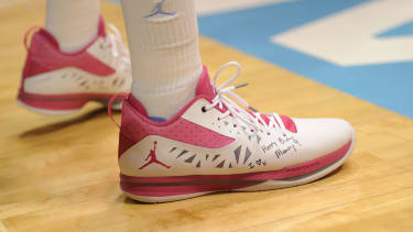 January 29th, 2012: North Carolina Tar Heels guard Kendall Marshall 5 inbounds the ball during NCAA College League USA basketball game between the North Carolina Tar Heels and the Georgia Tech Yellow Jackets as part of Coaches Vs. Cancer, at The Dean E. Smith Center, Chapel HIll, NC. UNC Players wore special pink Air Jordans and Kendall Marshall had a special birthday wish from his mother on his shoes. NCAA College League USA Basketball: Georgia Tech Yellow Jackets vs University of North Carolina JAN 29 - ZUMAc04