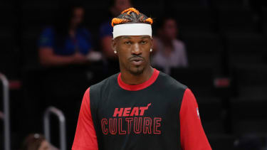 Miami Heat forward Jimmy Butler (22) warms up before an NBA basketball game against the Toronto Raptors, Thursday, Dec. 12, 2024, in Miami. (AP Photo/Marta Lavandier)