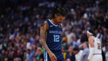 Apr 11, 2025; Denver, Colorado, USA; Memphis Grizzlies guard Ja Morant (12) following the loss to the Denver Nuggets at Ball Arena. Mandatory Credit: Ron Chenoy-Imagn Images