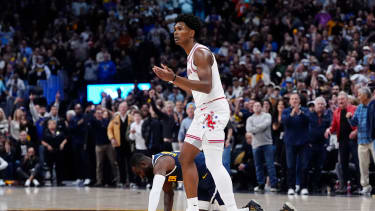 Dec 15, 2025; Denver, Colorado, USA; Houston Rockets guard Amen Thompson (1) reacts to his tripping foul on Denver Nuggets guard Tim Hardaway Jr. (10) in the fourth quarter at Ball Arena. Mandatory Credit: Ron Chenoy-Imagn Images