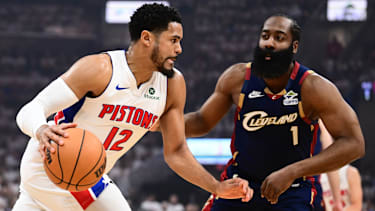 May 9, 2026; Cleveland, Ohio, USA; Detroit Pistons forward Tobias Harris (12) drives to the basket against Cleveland Cavaliers guard James Harden (1) during the first quarter of game three in the second round of the 2026 NBA Playoffs at Rocket Arena. Mandatory Credit: Ken Blaze-Imagn Images
