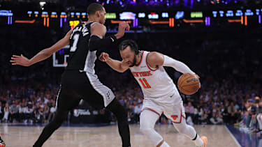 Jun 10, 2026; New York, New York, USA; New York Knicks guard Jalen Brunson (11) controls the ball against San Antonio Spurs forward Victor Wembanyama (1) in the second quarter during game four of the 2026 NBA Finals at Madison Square Garden. Mandatory Credit: Brad Penner-Imagn Images